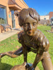 Boy and Girl Leapfrog Statue