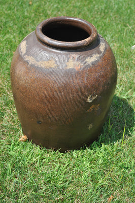 Antique Brown Combed Jar with Character